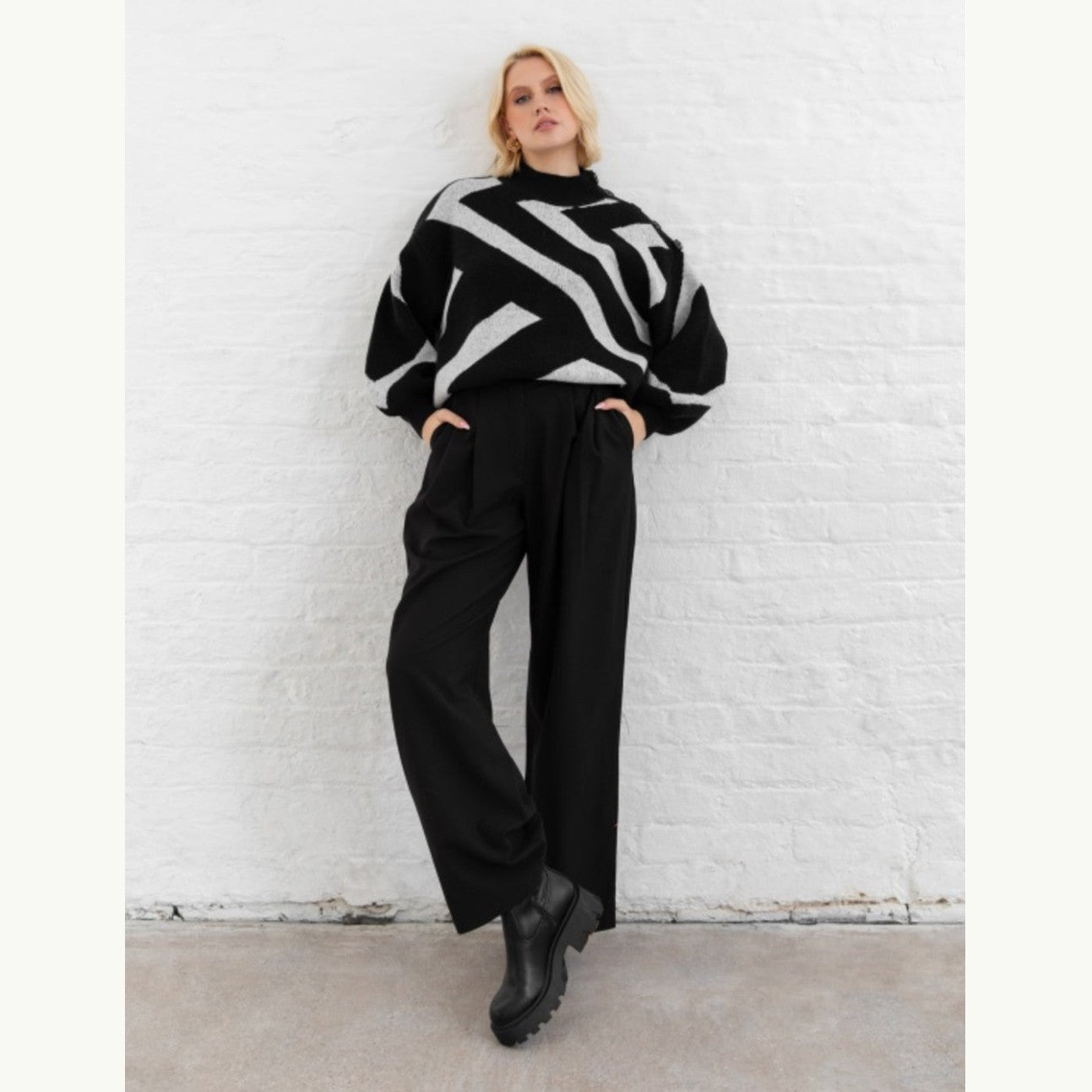 Black and grey geometric jumper