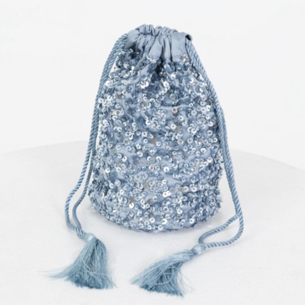 Blue sequin drawstring bag on a white background